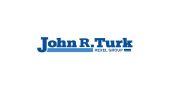 John R Turk logo